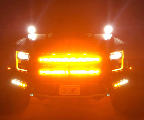 ford raptor generation 2 with 2 40in behind the grille light bars color amber in the dark