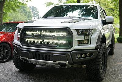 white ford raptor generation 2 with 2 40in behind the grille light bars color white 