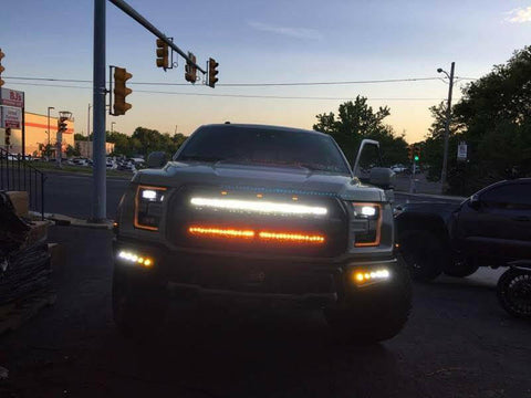  ford raptor generation 2 with 2 40in behind the grille light bars color white and amber in the dark