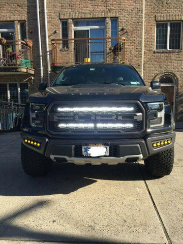 black ford raptor generation 2 with 2 40in behind the grille light bars color white