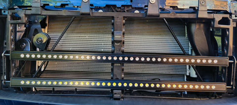 2019 2020 2021 Chevrolet Silverado two amber 40in light bars behind the grille showing metal bracket - M&R Automotive