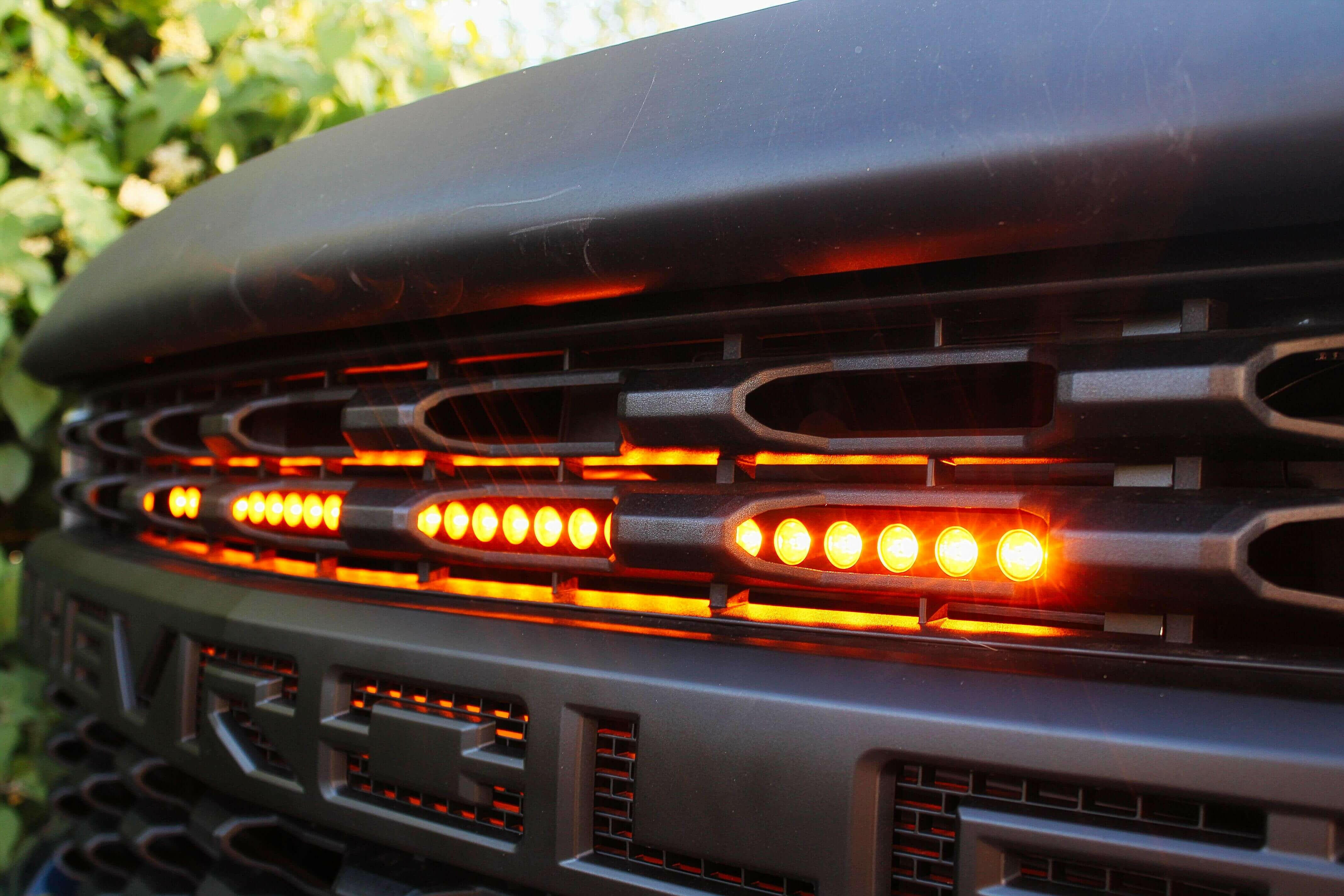 2019 2020 2021 blue chevrolet Silverado one amber 30in light bar behind the grille M&R Automotive