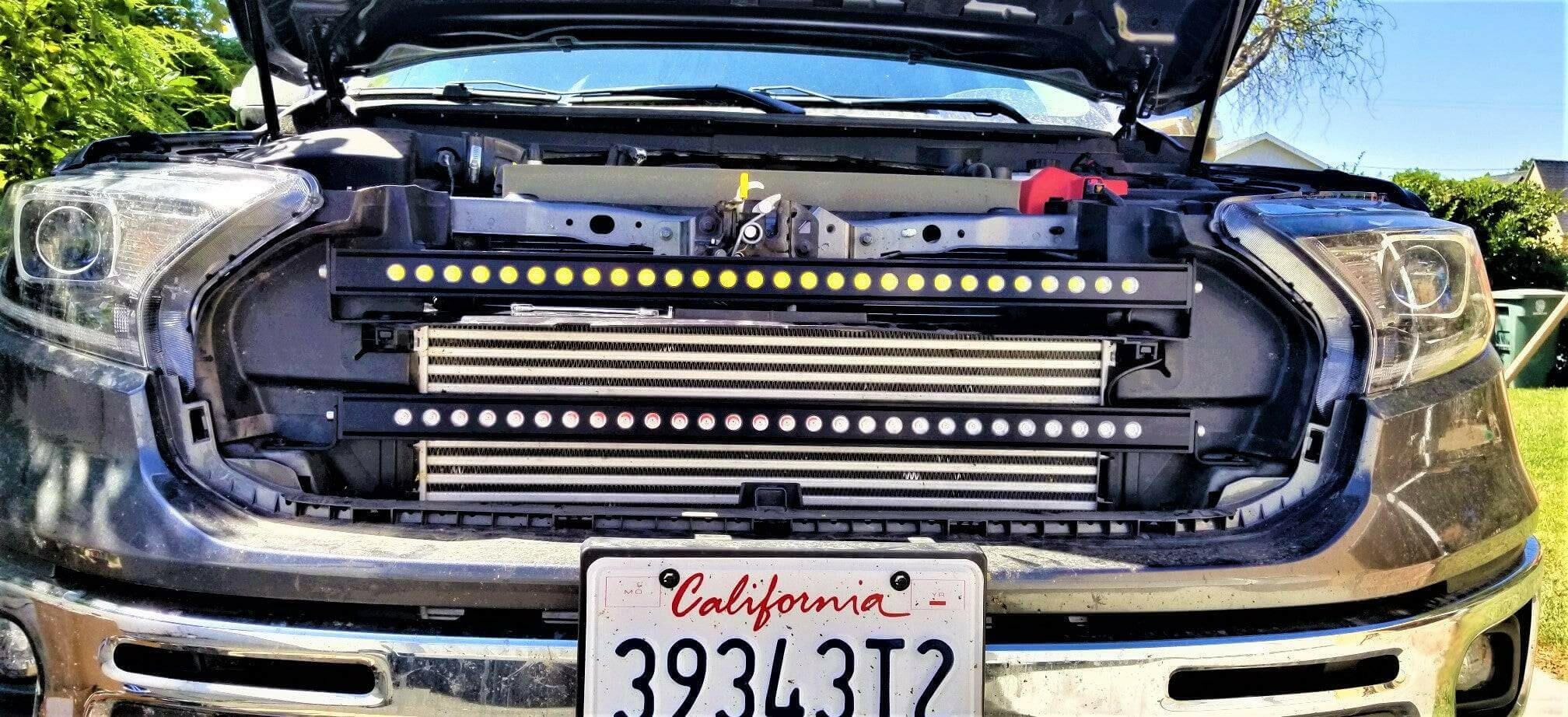 2019 2020 2021 2022 black ford ranger with one 30in light bar behind the grille