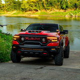 RAM Rebel fog light kit on red RAM 1500 parked by riverside, showcasing upgraded RAM Rebel fog light