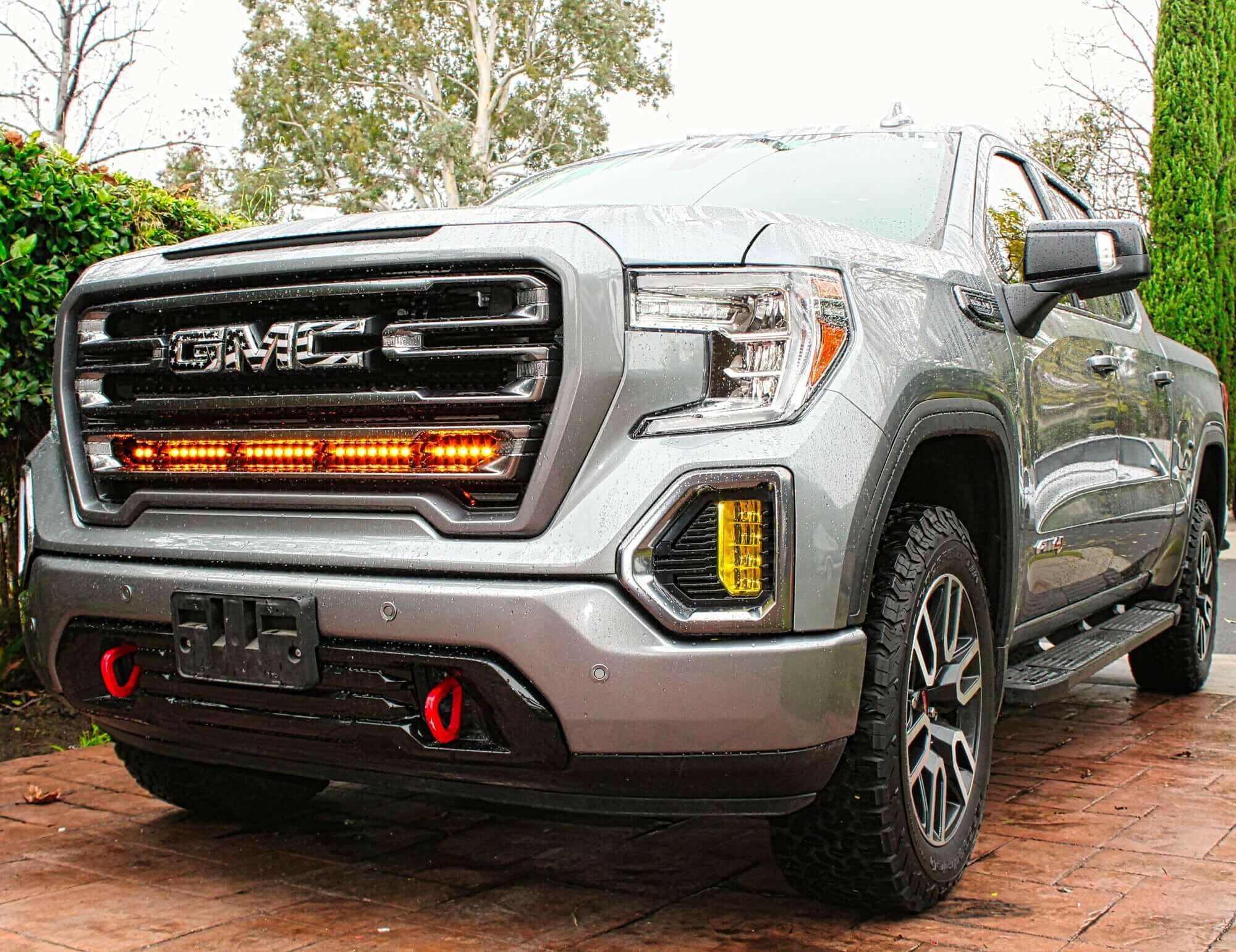 2019 2020 2021 2022 2023 gray GMC Sierra 1500 with one amber 40in Light Bar behind the grille