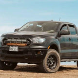 black 2019 2020 2021 2022 ford ranger off roading with 2 30in light bars behind the grille color