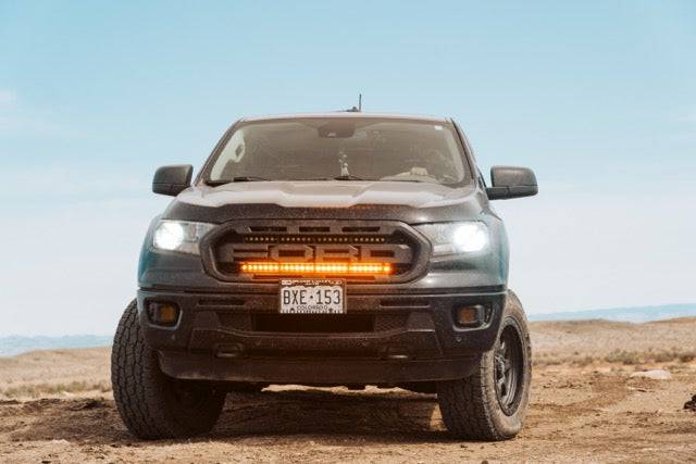 2019 2020 2021 2022 black ford ranger with one amber 30in light bar behind the grille