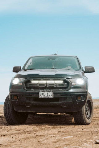 2019 2020 2021 2022 black ford ranger with one white 30in light bar behind the grille