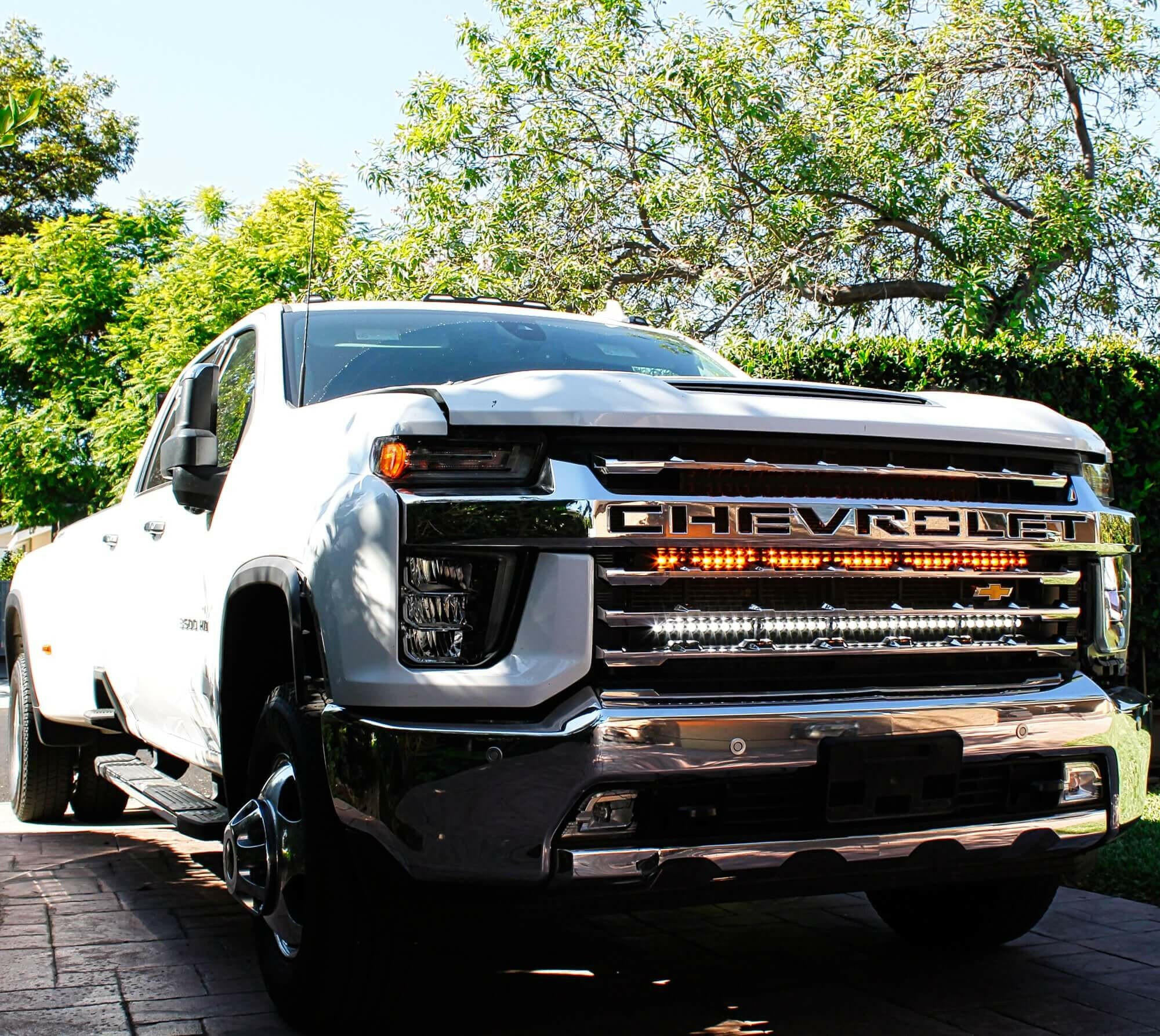 2020 2021 2022 2023 white Chevrolet Silverado 2500/3500HD two 40in light bars behind grille color amber and white - M&R Automotive