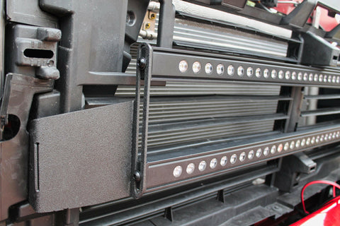 2020 2021 2022 2023 red GMC Sierra 2500 and 3500HD two 40in Light Bars behind the grille showing black metal bracket