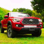 2016 2017 2018 2019 red Toyota Tacoma with one white 30in Light Bar