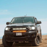black 2019 2020 2021 2022 ford ranger off roading with 2 30in light bars behind the grille color