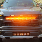 2021 2022 2023 ford raptor generation 3 with amber light bar behind the grille 
