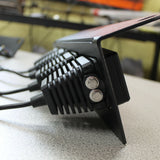 Side view 20watt light pods in metal bracket 