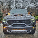 RAM Rebel Light Bar installed on 2019-2024 RAM 1500 Rebel front view in rain showcasing single 40in slim LED light bar