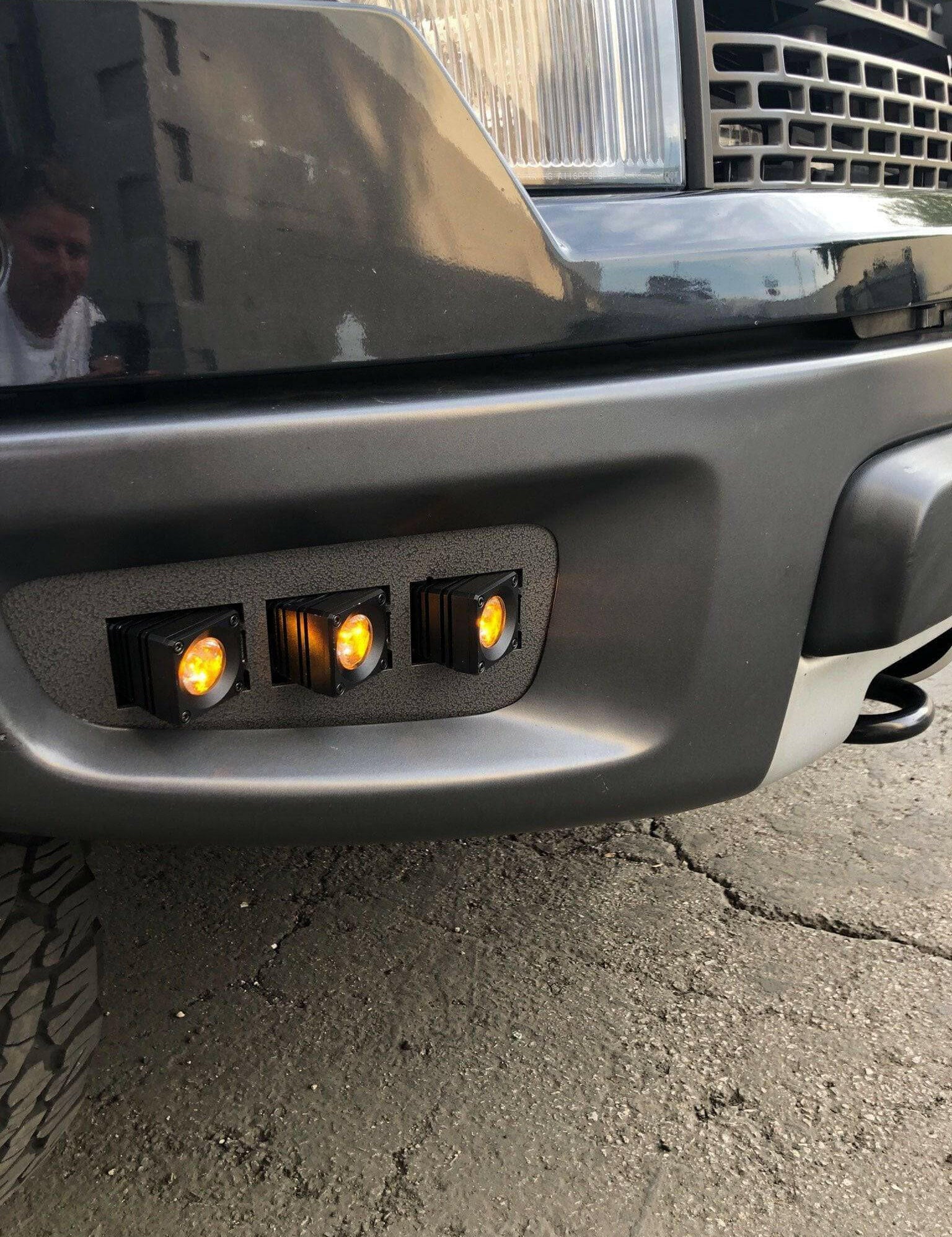2010-2014 Ford Raptor Gen 1 Dual Function Fog Light Kit with amber DRL pods installed, Ford Raptor Gen 1 fog light on front bumper