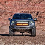 gray ford raptor generation 2 in the mountains with 2 40in behind the grille light bars color white and amber 