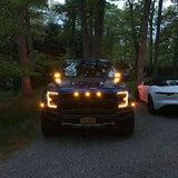 red ford raptor generation 2 2019 2020 with off roading 40watt square ditch lights in the dark