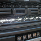 2021 2022 2023 ford raptor generation 3 with one white light bar behind the grille 