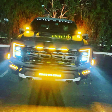 2021 2022 2023 ford raptor generation 3 with off roading lights on the truck