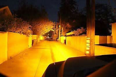 Ford Raptor Gen 2 Light Bars illuminating residential alleyway with bright amber beam pattern at night