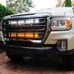 2021 2022 2023 GMC Canyon two 30in light bars behind grille color white and amber by M&R Automotive