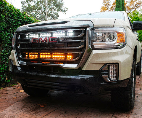 2021 2022 2023 GMC Canyon two 30in light bars behind grille color white and amber by M&R Automotive