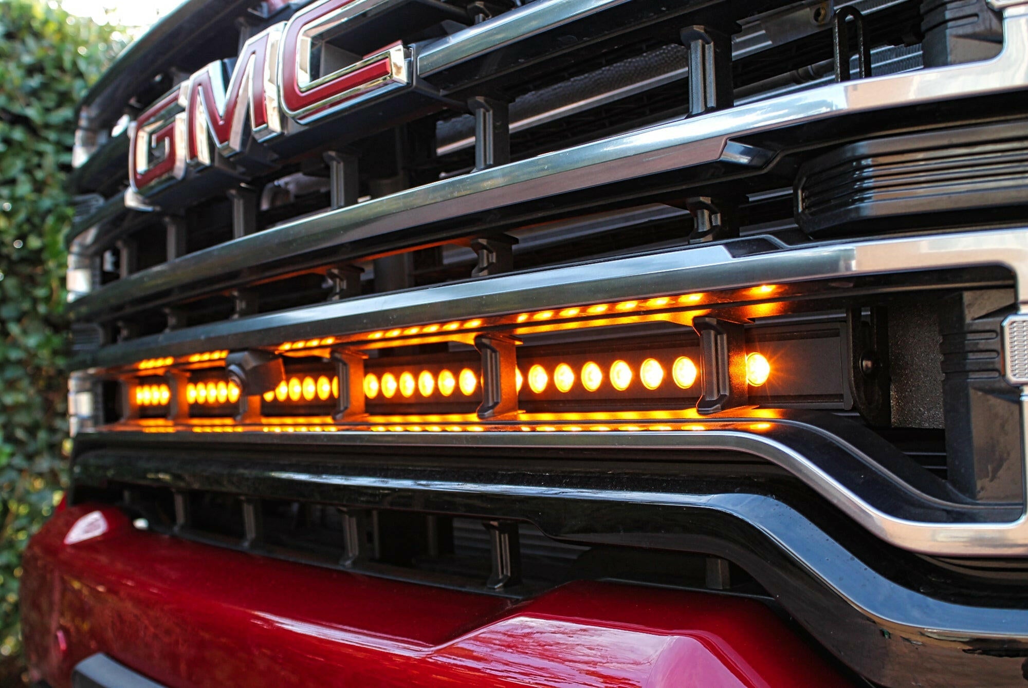 2020 2021 2022 2023 red GMC Sierra 2500/3500HD one amber 40in light bar behind the grille