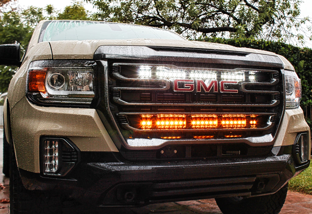 2021 2022 2023 GMC Canyon two 30in Light Bars behind the grille color white and amber by M&R Automotive