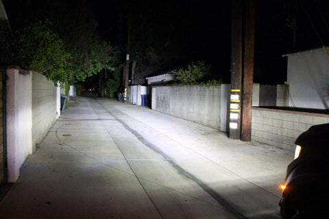 RAM Rebel Light Bar illuminating dark alleyway with bright focused beam pattern for 2019-2024 RAM 1500 Rebel