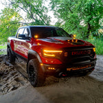Red RAM 1500 Rebel with installed RAM Rebel Light Bar under bridge, showcasing 40in slim LED front light bar upgrade