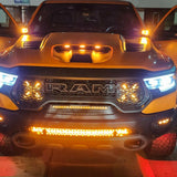 RAM Rebel Light Bar installed on yellow RAM 1500 Rebel with bright amber LED light bar illuminated at night