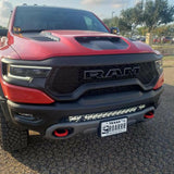 RAM Rebel Light Bar installed on red 2019-2024 RAM 1500 Rebel with single slim 40in LED light bar mounted in front bumper