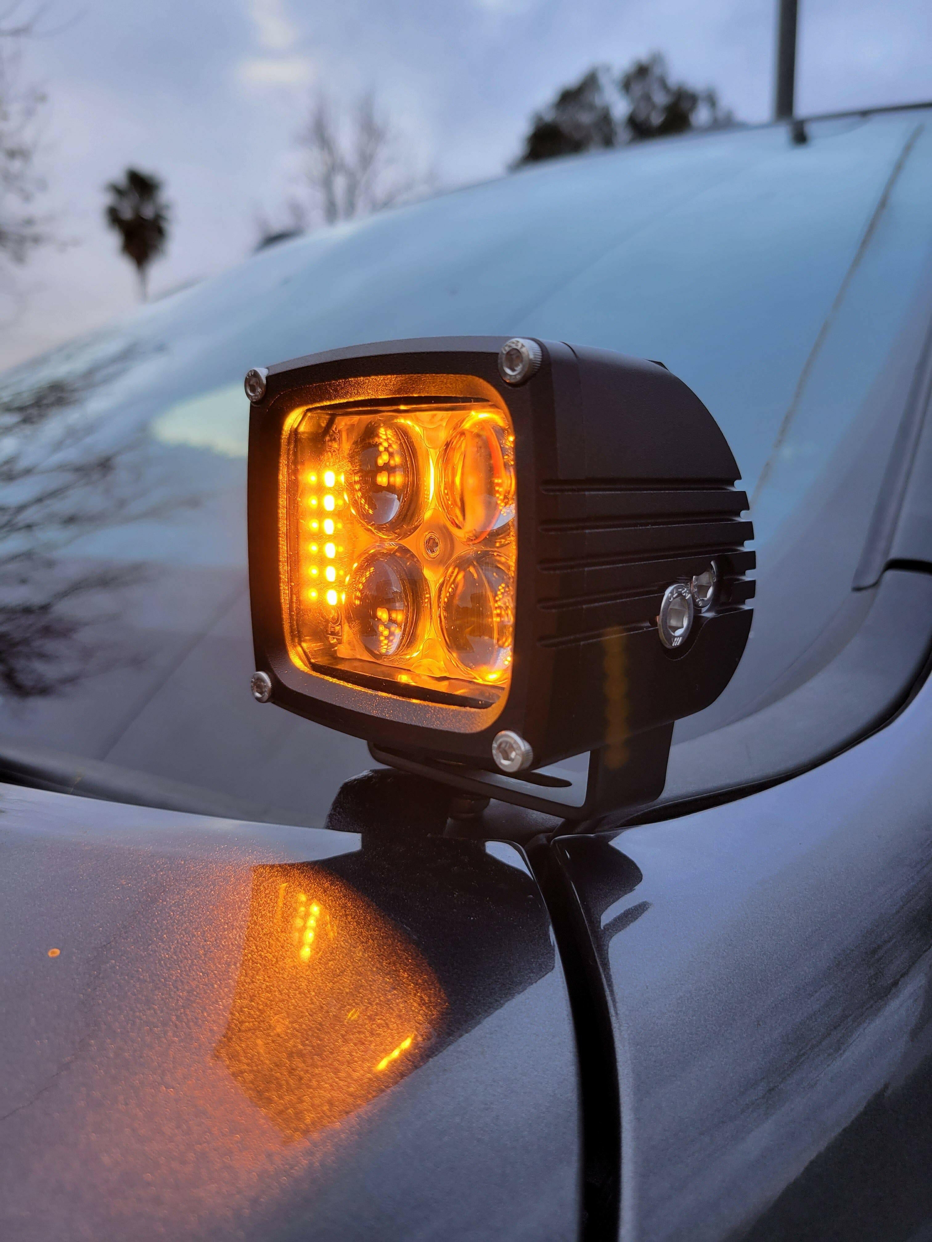 2025+ RAM 2500 3500 Ditch Lights dual color LED amber DRL backglow mounted on truck hood