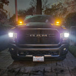 2025+ RAM 2500 3500 Ditch Lights with white beams and amber DRL backglow illuminated at night