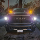 2025+ RAM 2500 3500 Ditch Lights with white beams and amber DRL backglow illuminated at night