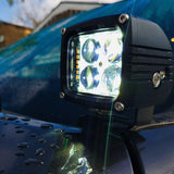 2025+ RAM 2500 3500 Ditch Lights dual color LED ditch light with bright white beam and amber DRL backglow mounted on truck hood