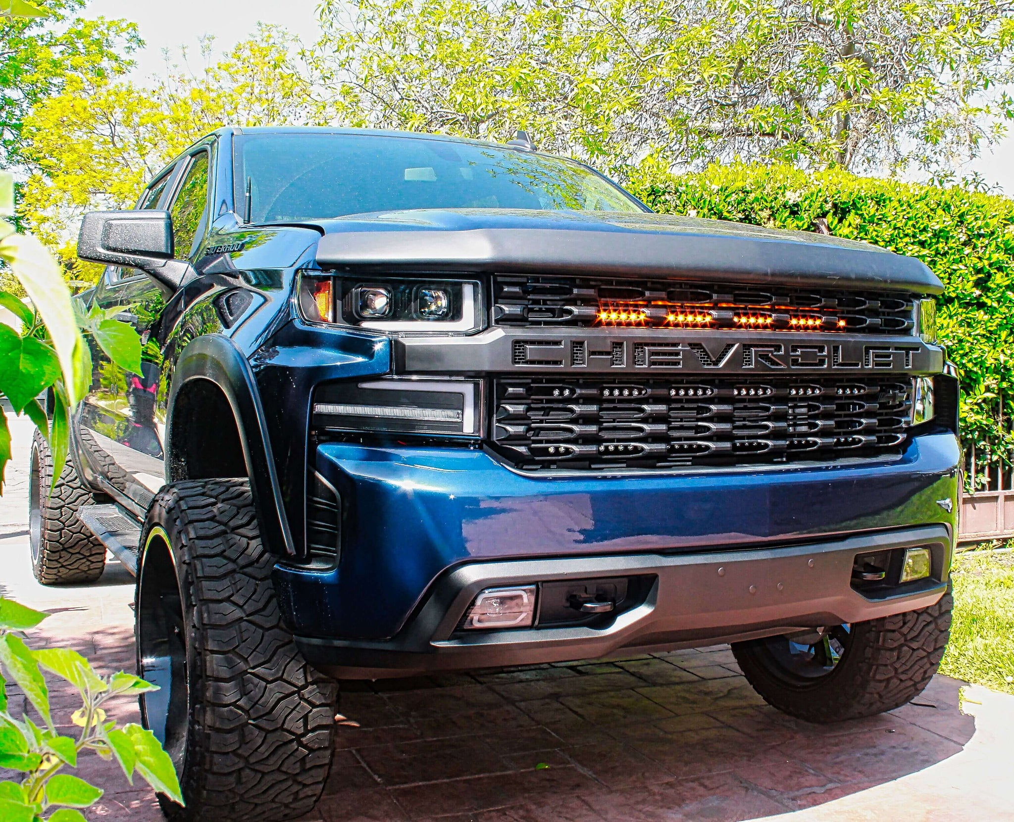2019 2020 2021 blue chevrolet Silverado one amber 30in light bar behind the grille M&R Automotive